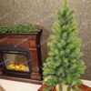 Umelý vianočný stromček 100% 3D Mini Smrek, stromček je osadený v jutovom kvetináči a má svetlozelené ihličie