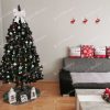 umelý vianočný stromček Borovica Zasnežená 220cm vo vianočne vyzdobenej miestnosti