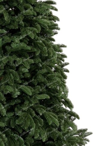 Detail stromčeka Umelý vianočný stromček FULL 3D Jedľa Pôvabná. Stromček má husté tmavozelené ihličie.
