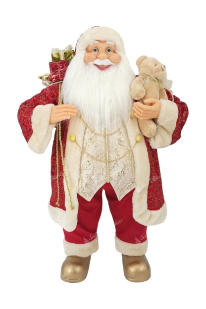 Dekorácia Santa Claus Červeno-Zlatý 80cm, má červený kabát so vzorom a zaltými retiazkami, pod ním zlatú vestu a na nohách obuté zlaté topánky. v ruke drží plyšovú hračku
